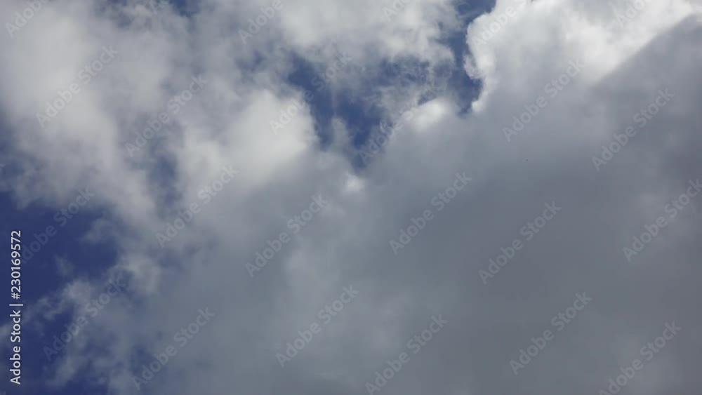 Video of white cloud moving on blue sky in the afternoon. Video of white cloud moving on blue sky in the afternoon.