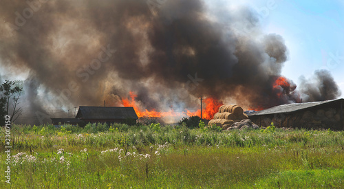 a terrible fire of a hay warehouse in the village