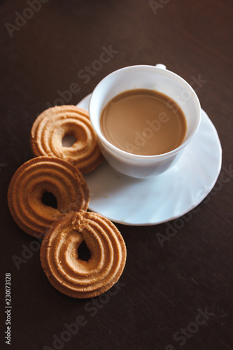 Cup of coffee and biscuits