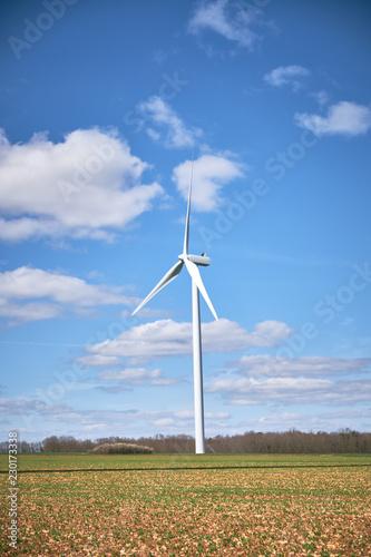 Aerial view modern wind turbine alternative energy. Ecology and care of nature. Environmentally friendly.