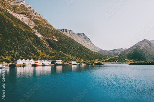 Husoy village in Norway mountains and sea fjord landscape Travel locations scandinavian scenery Senja islands