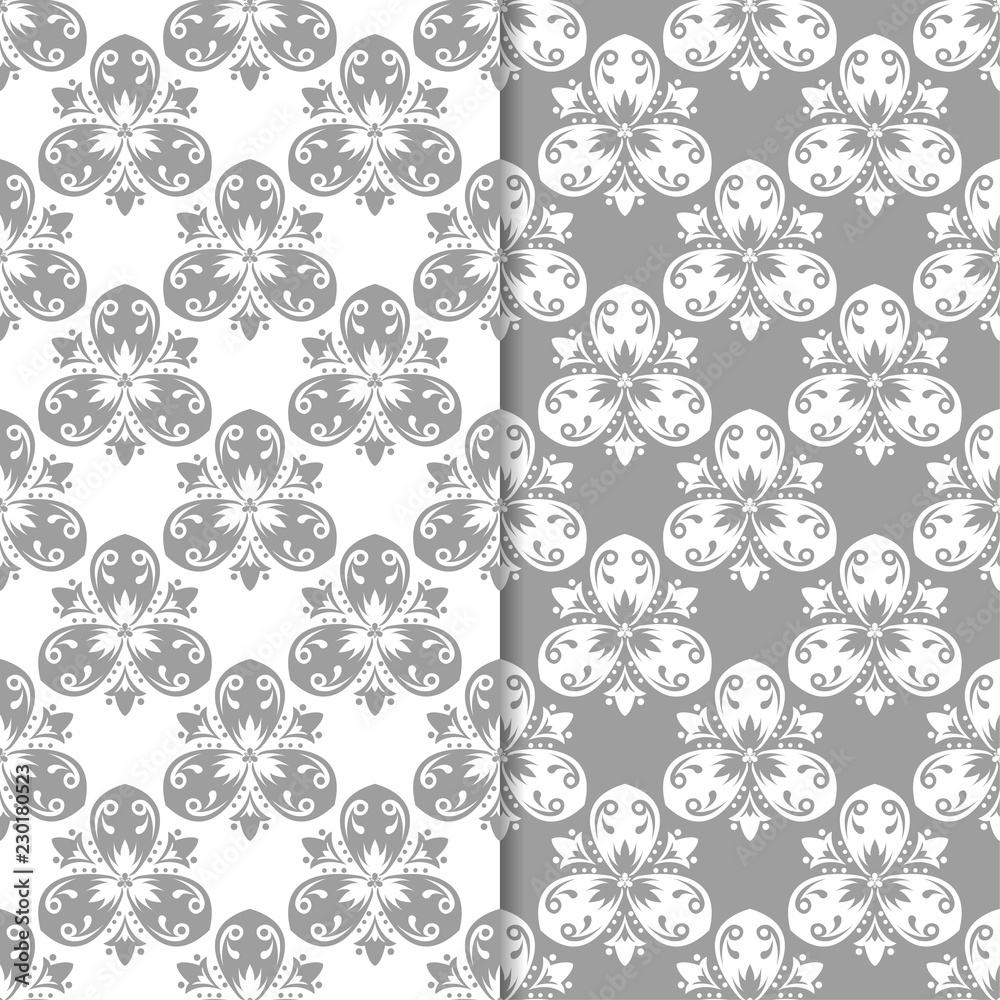 White and gray set of floral seamless patterns White and gray set of floral seamless patterns