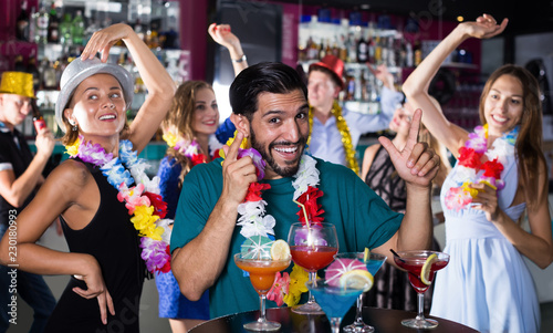 Happy male is having fun on hawaiian party