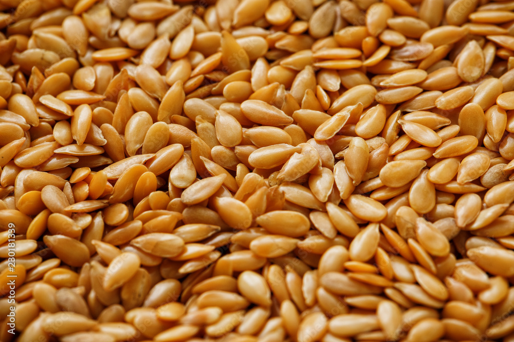 Background texture of white flax seeds. Useful cereals. Background texture of white flax seeds. Useful cereals.