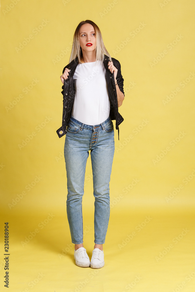 Full length portrait of young confident woman posing showing pas Full length portrait of young confident woman posing showing pas
