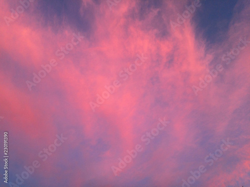 Beautiful pastel cloudy sunset with blue sky 