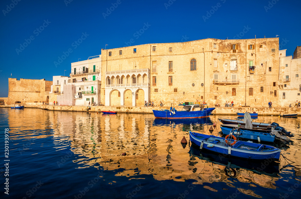 Old port of Monopoli province of Bari, region of Apulia, southern Italy. Boats in the marina of Monopoli.