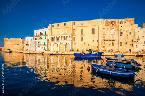 Old port of Monopoli province of Bari, region of Apulia, southern Italy. Boats in the marina of Monopoli.