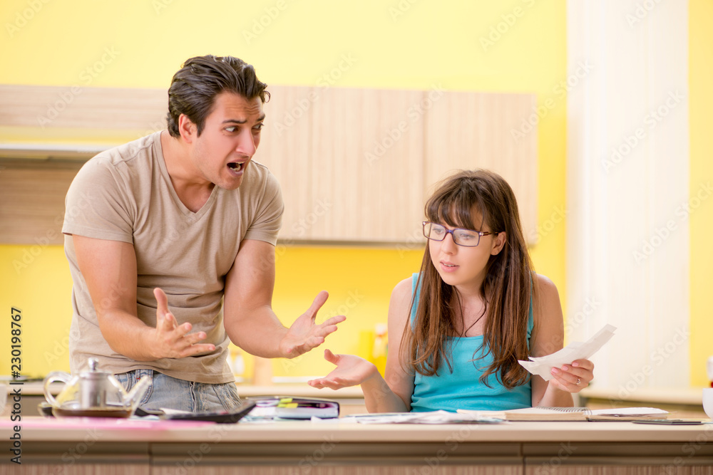 Fototapeta premium Young family struggling with personal finance