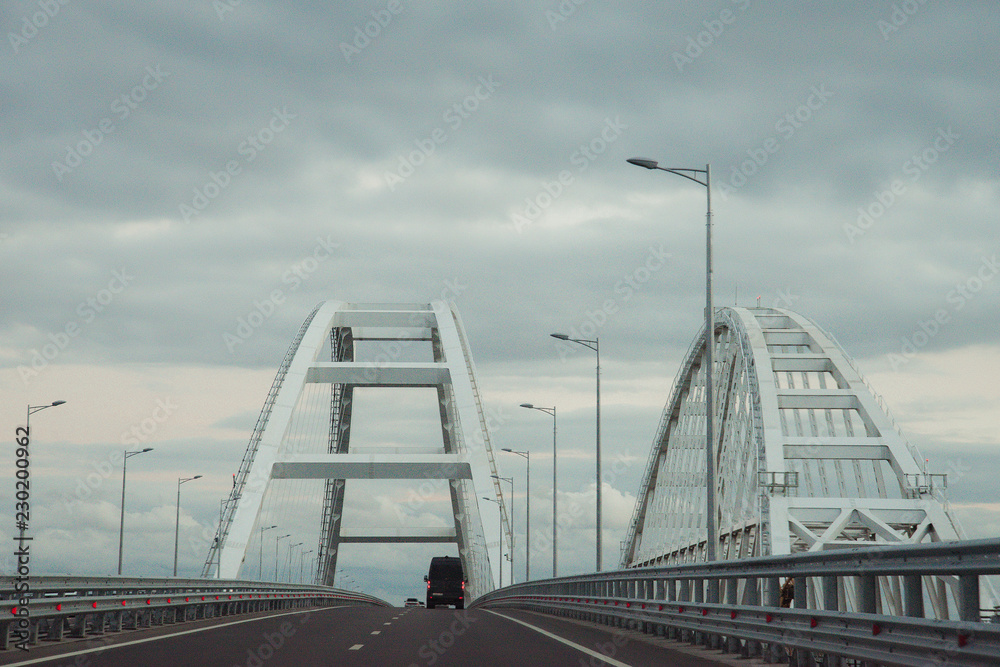 the Car rides on the road bridge connecting the banks of the Kerch Strait between Taman And Kerch. Crimean bridge October, 2018