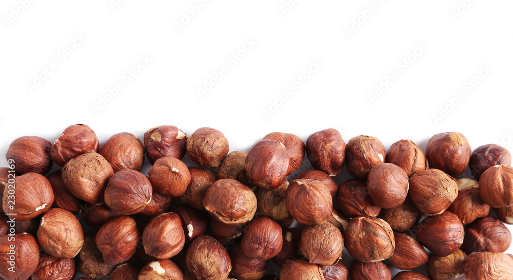 heap of hazelnut kernels isolated on white background heap of hazelnut kernels isolated on white background