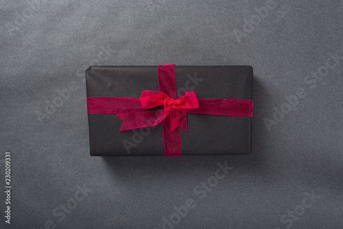 Gift box with red ribbon, top view