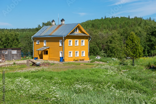 Residential building and boulder bath Holy Trinity Anzersky monastery of the Solovki monastery on the Anzersky island, Solovki islands, Arkhangelsk region, Russia