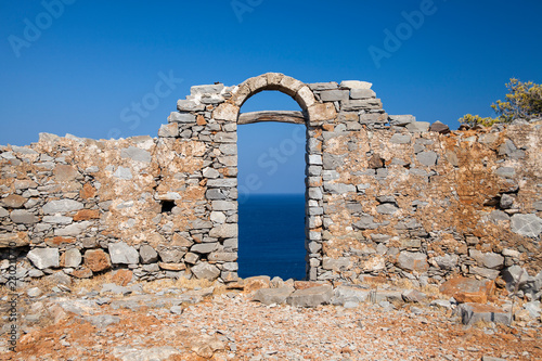 The historic walls of the museum on the island of Spinalonga. Kalydon in the Gulf of Elounda in Crete. The lepers' island. Historic ruins and homes of lepers.