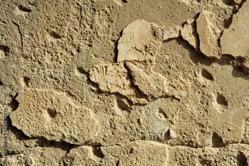 Détail de mur abîmé avec enduit manquant