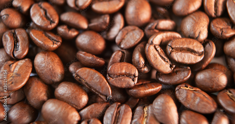 Naklejka premium grains de café en gros plan