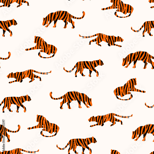 Seamless exotic pattern with abstract silhouettes of tigers.