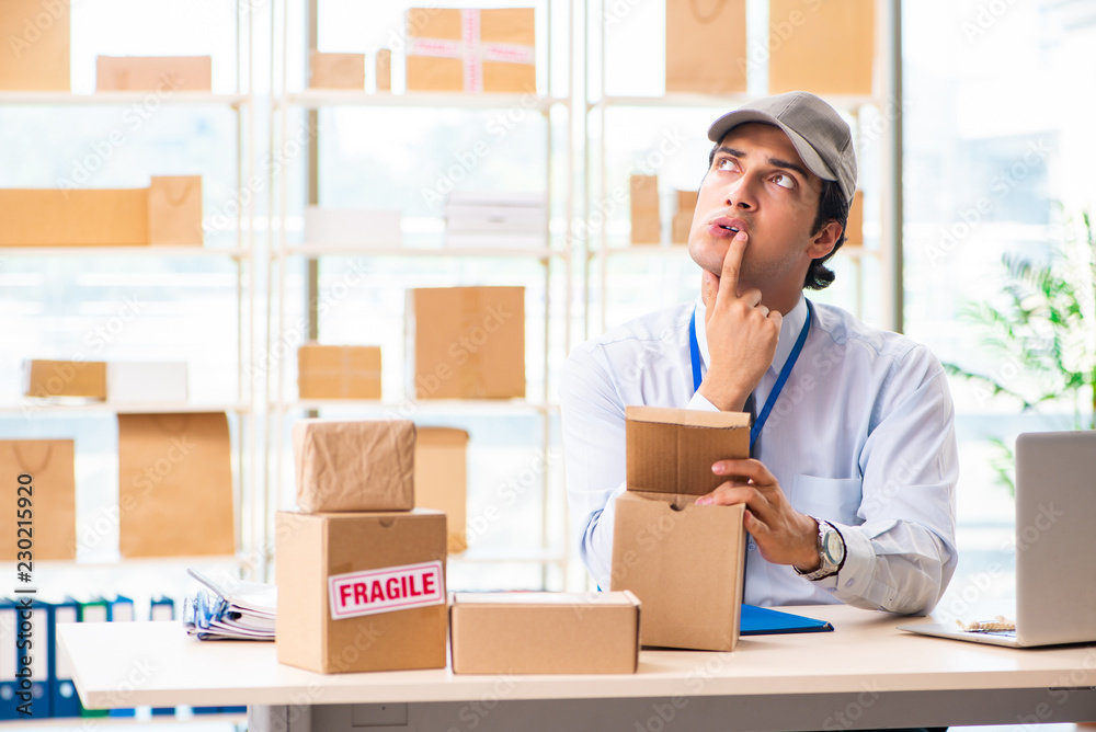 Male employee working in box delivery relocation service Male employee working in box delivery relocation service