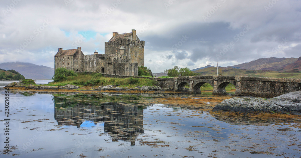 Reflections of a Scottish castle in the water.