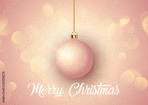 Rose gold Christmas background with hanging bauble