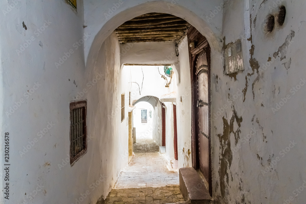 Narrow medieval street in the white medina of the Tetouan city, Morocco in Africa