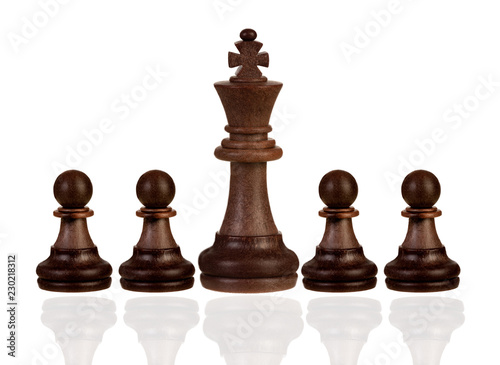 Wooden pawns team with it´s king