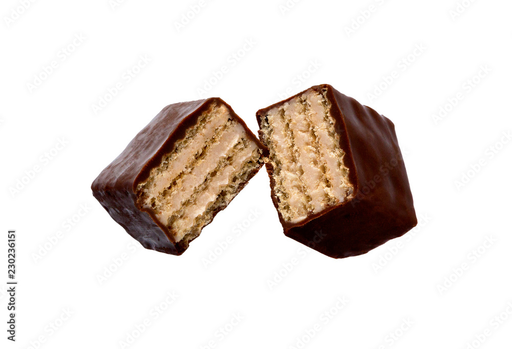 Chocolate candy with filling isolated on a white. Chocolate wafer candies. Chocolate candy with filling isolated on a white. Chocolate wafer candies.