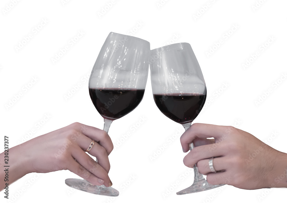Close-up partial view of two friends clinking transparent glasses of red wine. ready to use and work path. isolated on white background