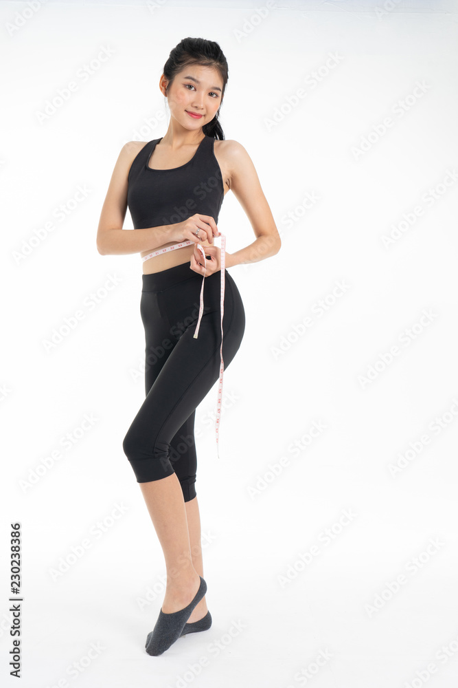 Sporty young asian woman doing yoga practice isolated on white background - concept healthy life fitness for slim. Sporty young asian woman doing yoga practice isolated on white background - concept healthy life fitness for slim.