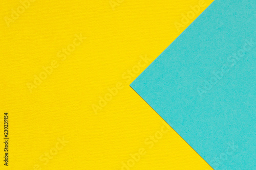 Blue and yellow background texture of colored paper. Trendy colors for design. Abstract geometric background