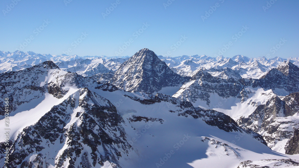 gorgeous winter mountain landscape with the famous Piz Linard in the Swiss Alps