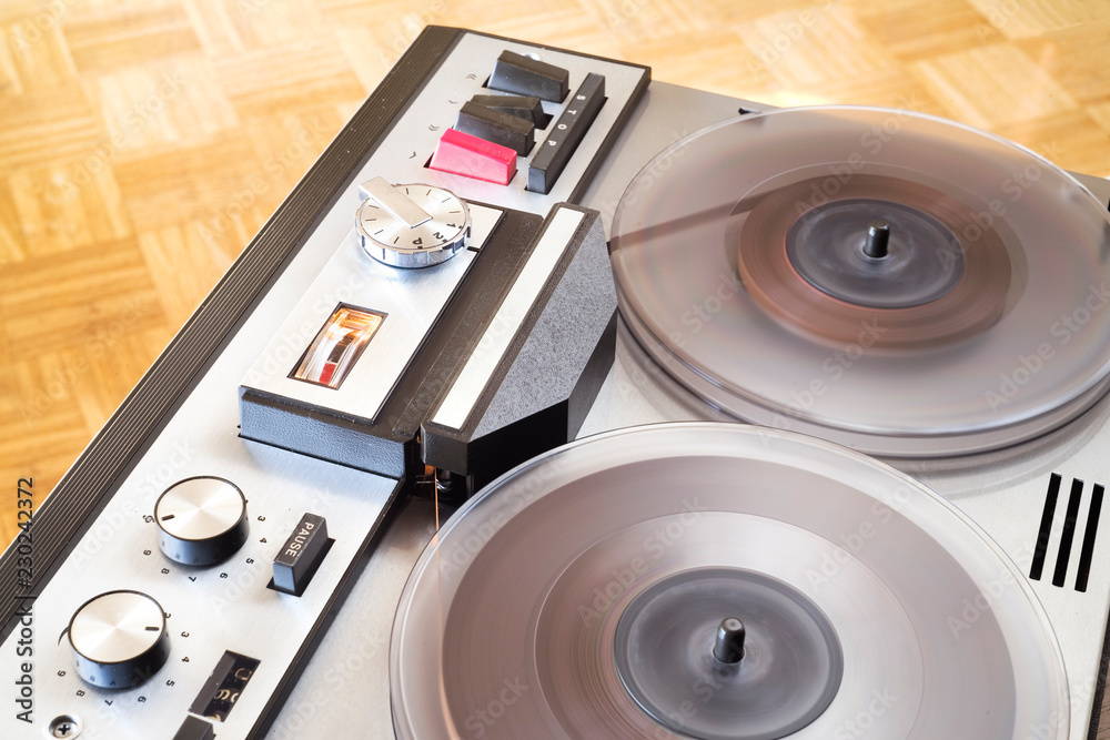 vintage reel to reel tape recorder in full operation, close up Stock Photo