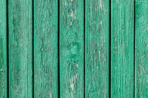 Old painted vertical wood boards texture background close-up view