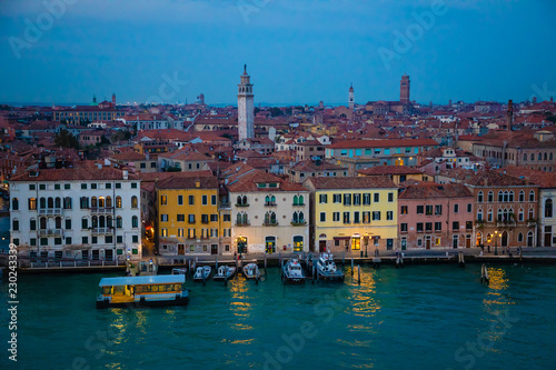 Night view of old houses on Grand Canal in Venice in Italy