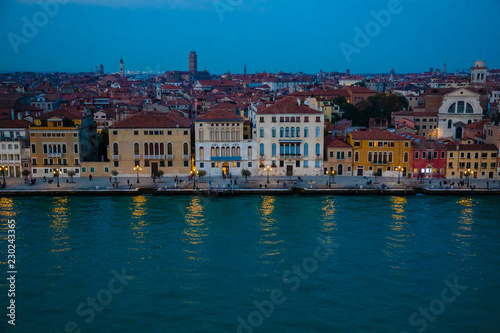 Night view of old houses on Grand Canal in Venice in Italy