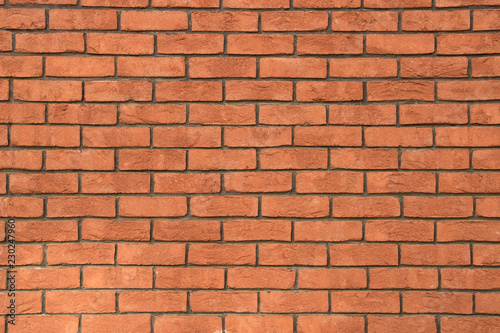 brick textured orange wall