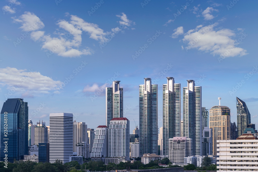 cityscape of Bangkok city skyline with blue sky background, Bangkok city is modern metropolis of Thailand and favorite of tourists