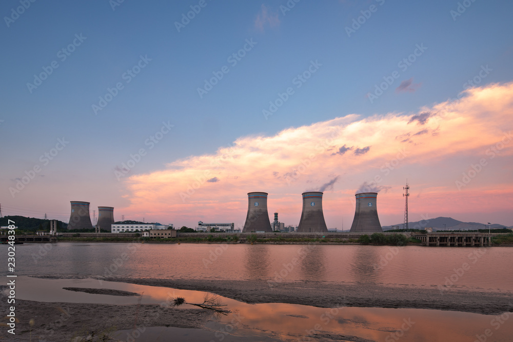 Obraz premium power plant with sunset