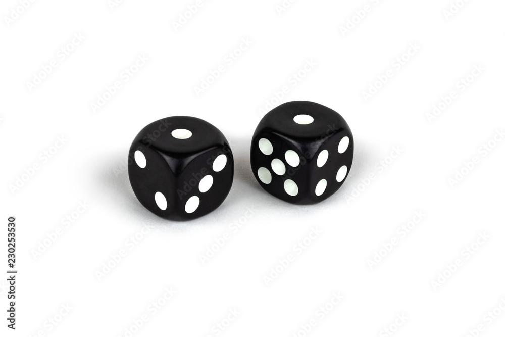 Two black dice isolated on a white background. One and one
