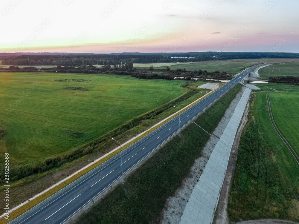 road to the field in the North of Russia