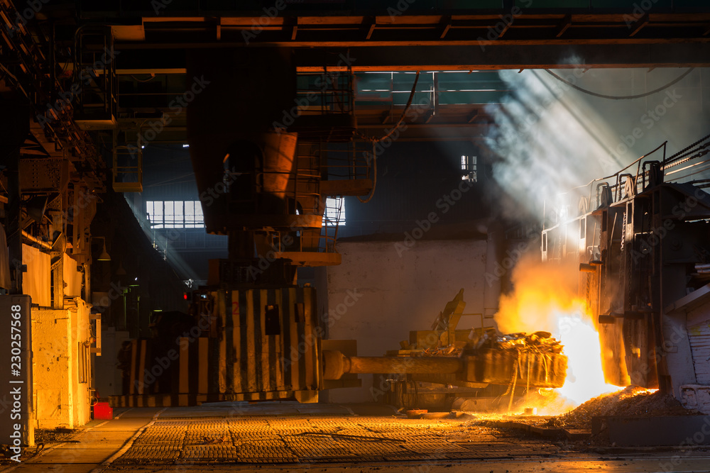 Obraz Loading of ore in the open-hearth furnace at a metallurgical plant