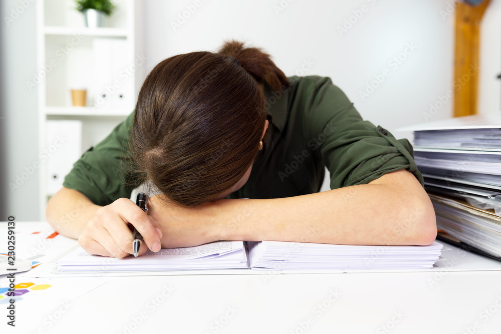 Businesswomen overworked in office. Business finance concept. Businesswomen overworked in office. Business finance concept.
