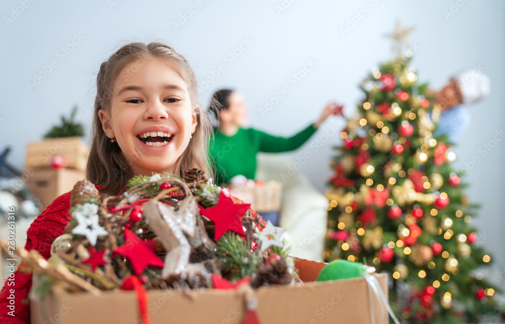 family preparing for Christmas