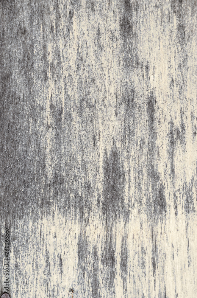Abstract grungy background of surface of old weathered wooden board.Aged wood texture.