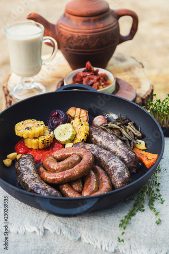 Grilled different meat saus...