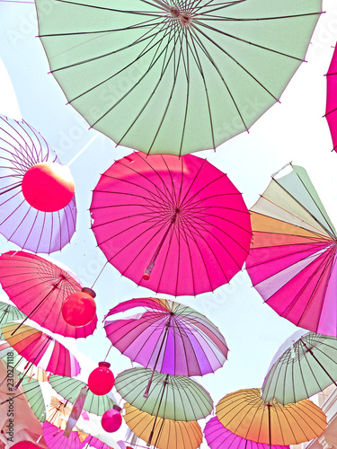Many spanned colorful umbrellas in the sky - aufgespannte bunte Schirme am Himmel    