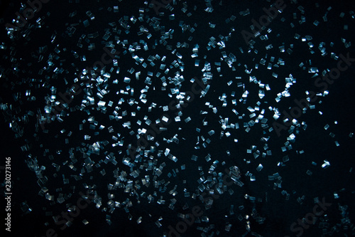 Shards of glass on the black background