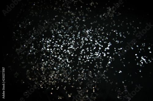 Shards of glass on the black background