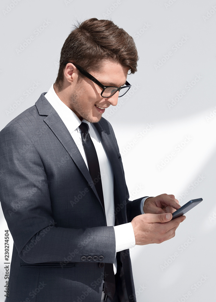 close up.smiling businessman talking on mobile phone close up.smiling businessman talking on mobile phone
