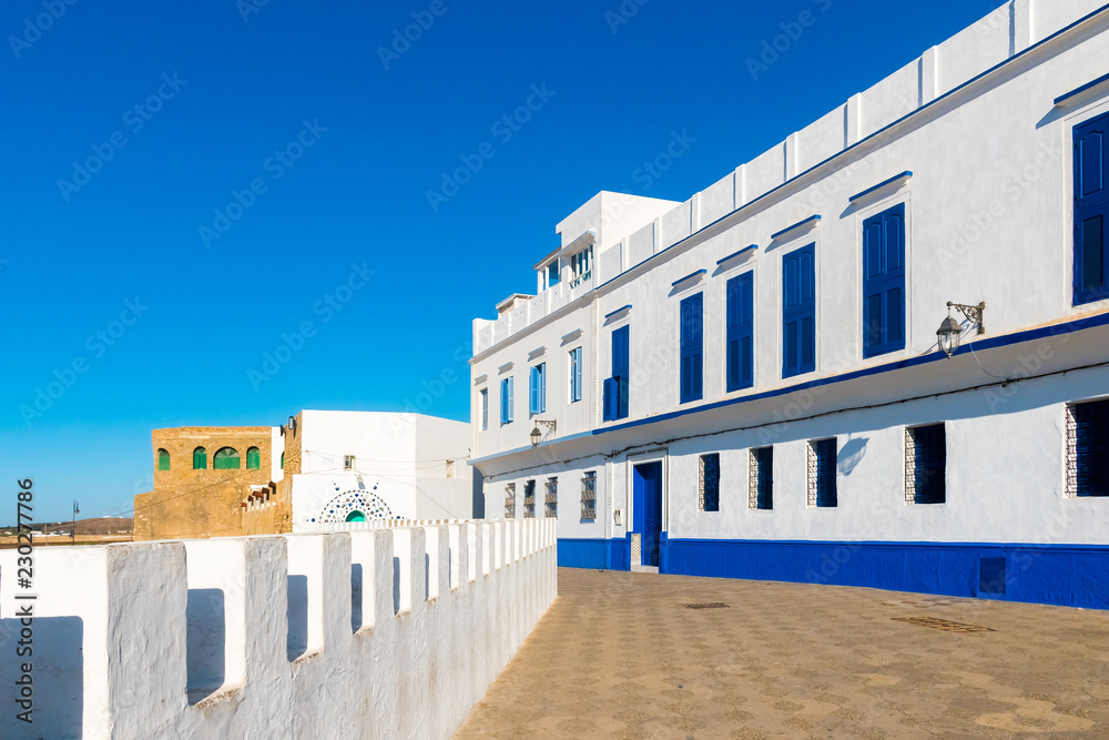 Beautiful promenade on the city wall of the ancient white city Asilah in Morocco